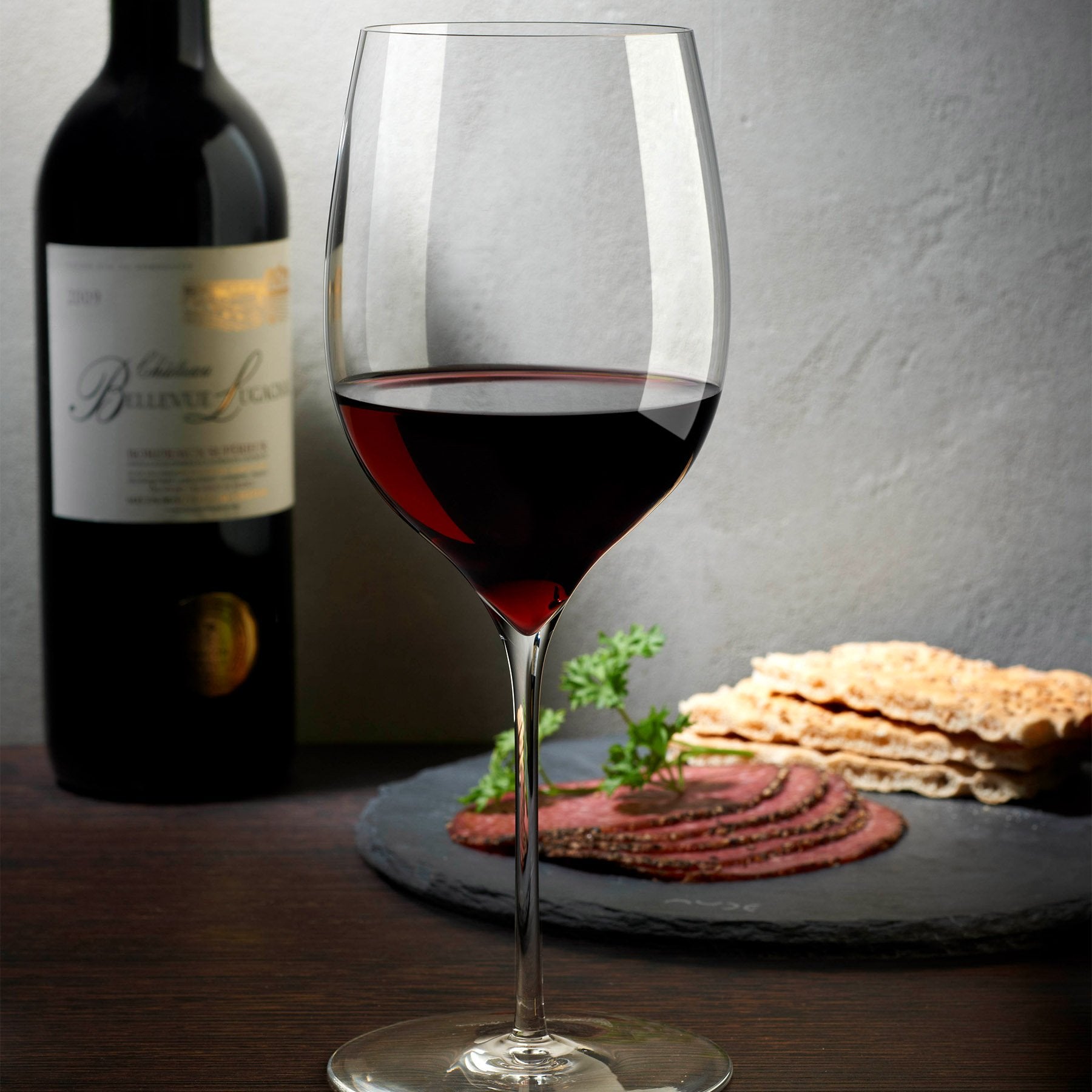 http://us.nudeglass.com/cdn/shop/products/duzenlemeler_0003_Lifestyle_-_Dimple_Powerful_Red_Wine_Glass_-_31913_-_1050933.jpg?v=1571710868