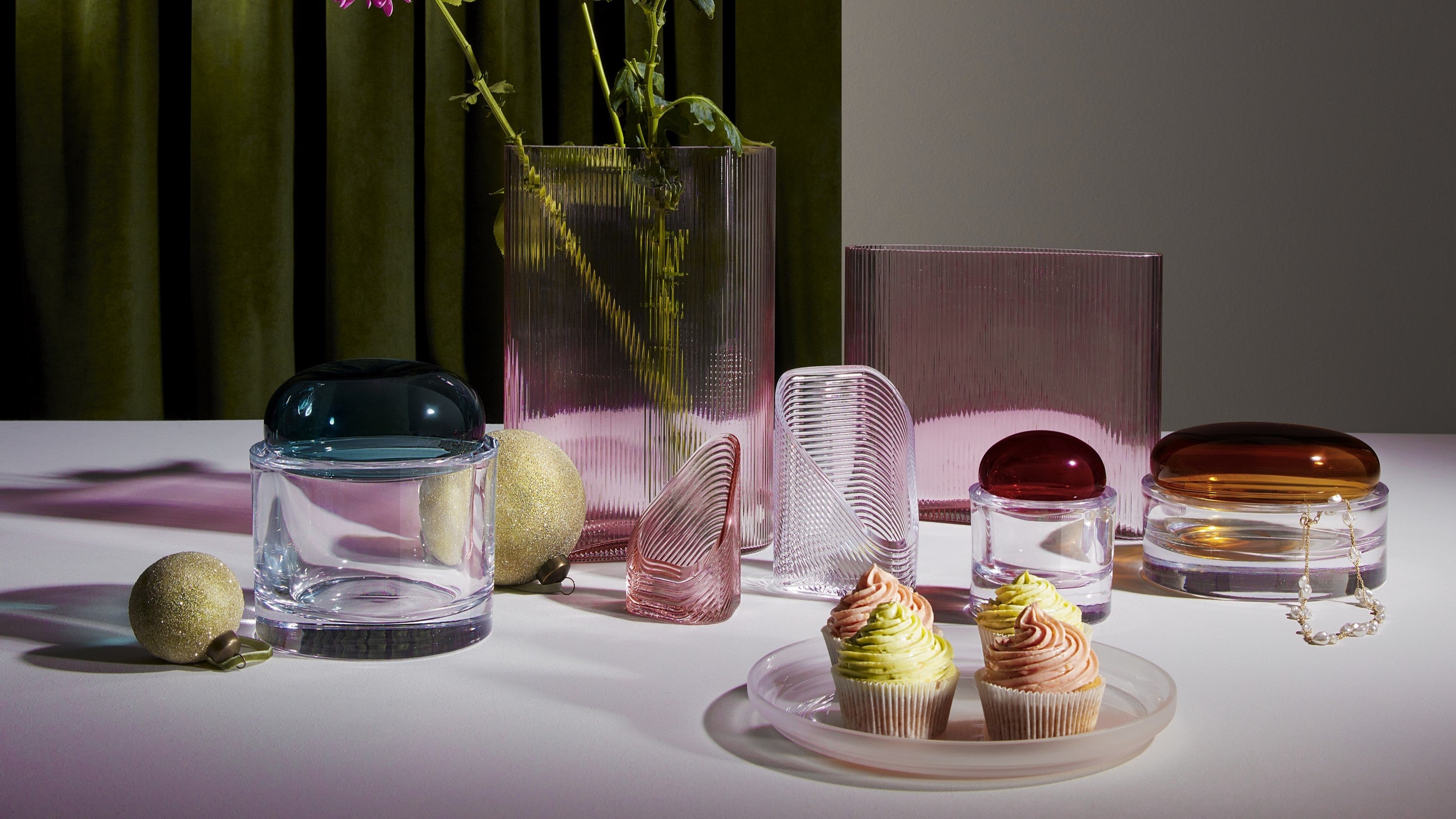 NUDE glass Ecrin collection of storage boxes, Mist Light votives presented with sweets