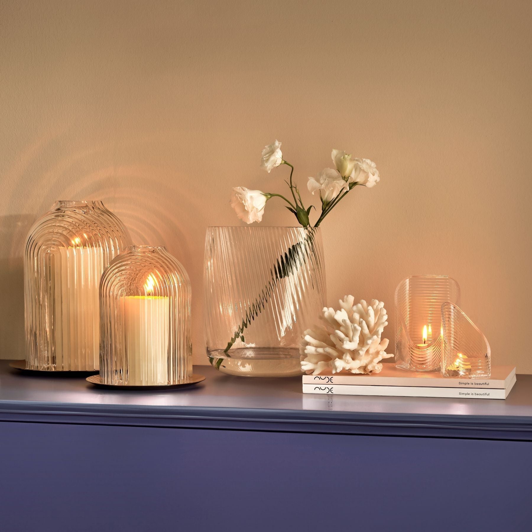 NUDE Ilo candleholder, Opti vase and Mist votive holder collection styled together