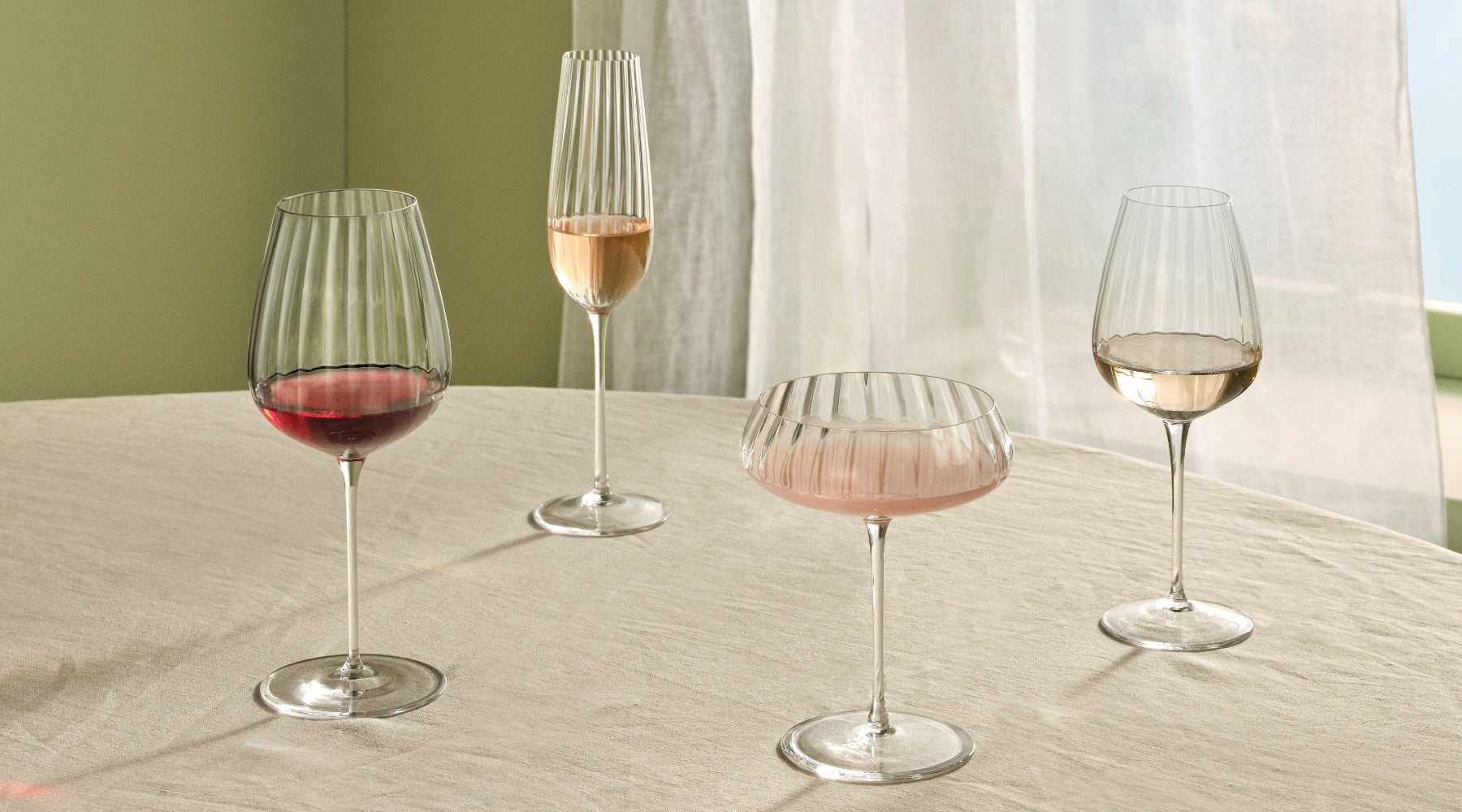 NUDE Round up glass collection, wine collection of red, white, sparkling and coupe glasses with a ribbled glass effect