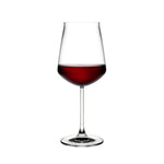 NUDE Salute red wine glass filled with red wine, timeless lead-free crystal design on a white background