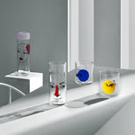 NUDE Finesse Rok & Pop glassware collection with its jugn high ball glass and whisky glass in light neon environment
