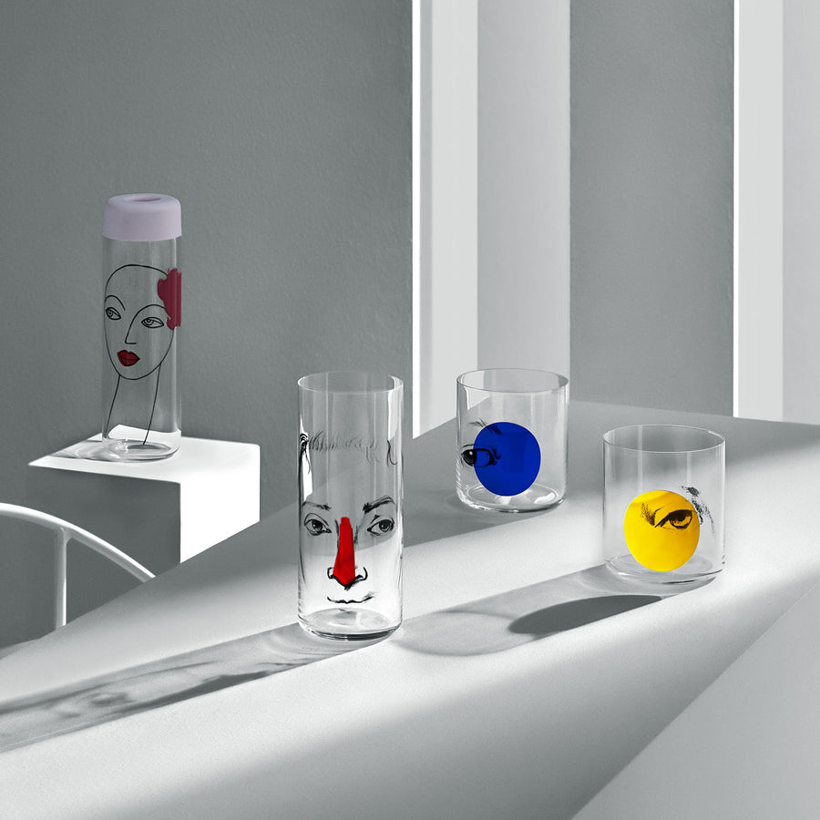 NUDE Finesse Rok & Pop glassware collection with its jugn high ball glass and whisky glass in light neon environment