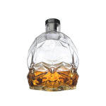 NUDE Memento Mori skull shaped whisky bottle filled front view