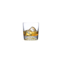 NUDE Ace whisky glass with golf pattern on the bottom filled with whisky