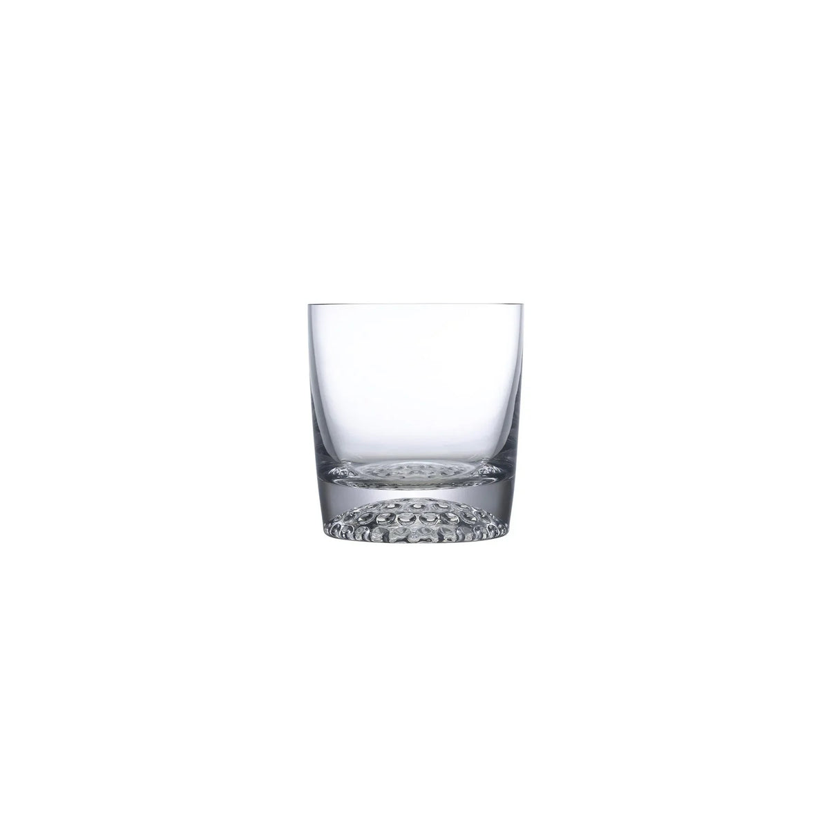 NUDE Ace whisky glass with golf pattern on the bottom empty