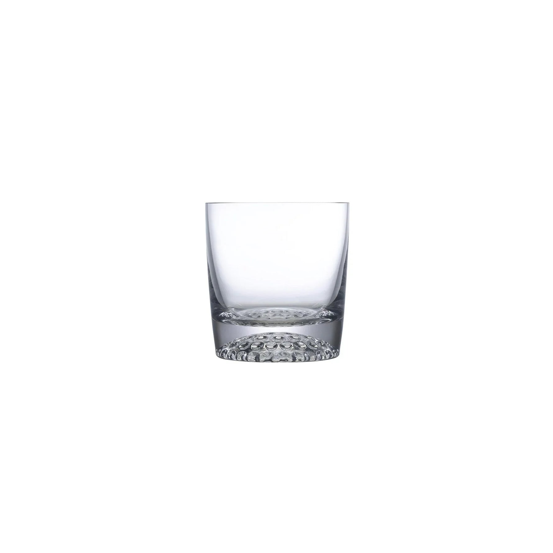NUDE Ace whisky glass with golf pattern on the bottom empty