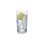 NUDE Ace high ball glasses with golf pattern on the bottom filled with sparkling drink